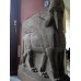 Assyrian lamassu, human head, bull body, eagle wings
